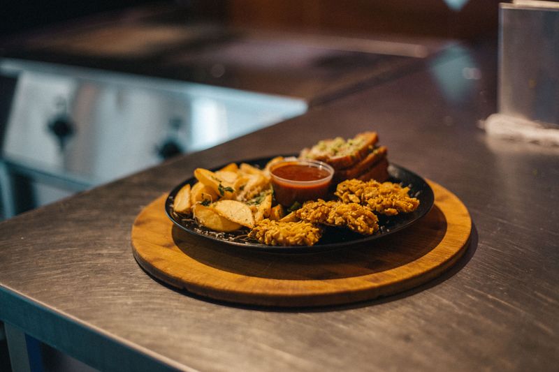Spicy Starbird Tenders with fiery hot sauce