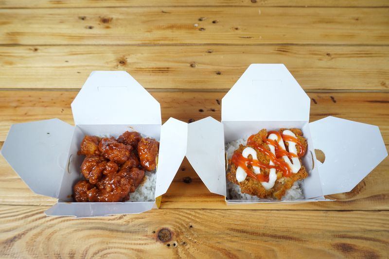Buffalo Chicken Bowl with crispy tenders and spicy drizzle